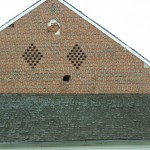 cannonball-scar A hole left by a cannon ball on the 2nd day's fighting can still be seen on this barn.