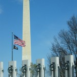 ww2-mem The WWII Memorial, with the Washinton Monument and the Capitol Building in the background.